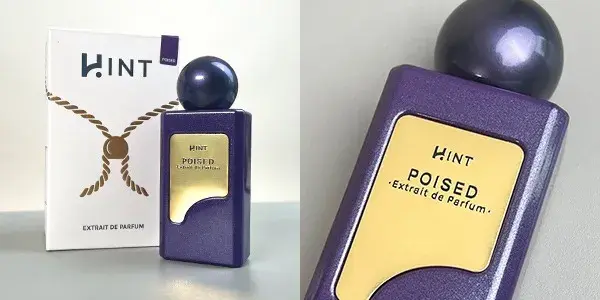 Botol parfum HINT EDP Poised dengan sentuhan glitter ungu dan aksen gold